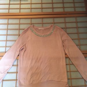 Peach colored sweater with jeweled collar